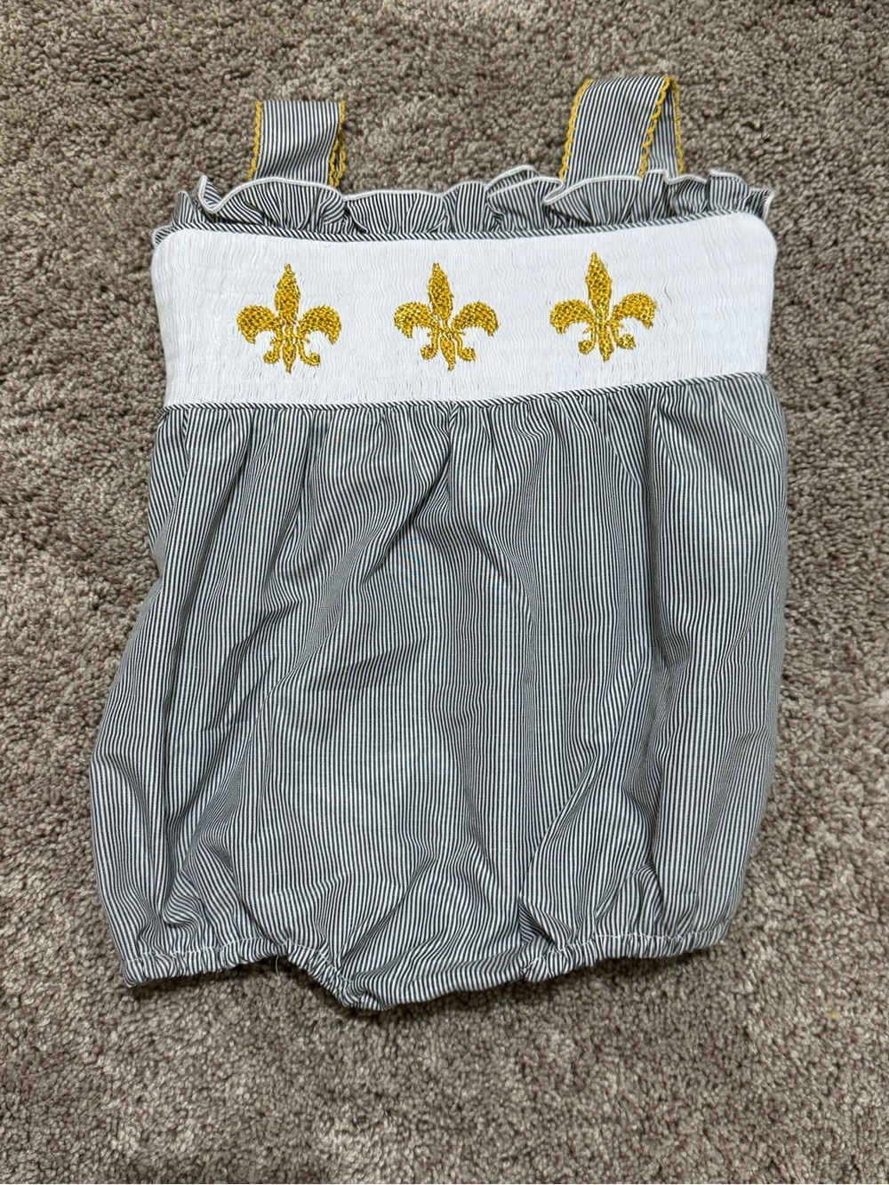 Girls Black & White Striped Smocked Romper with Gold Fleur-de-Lis